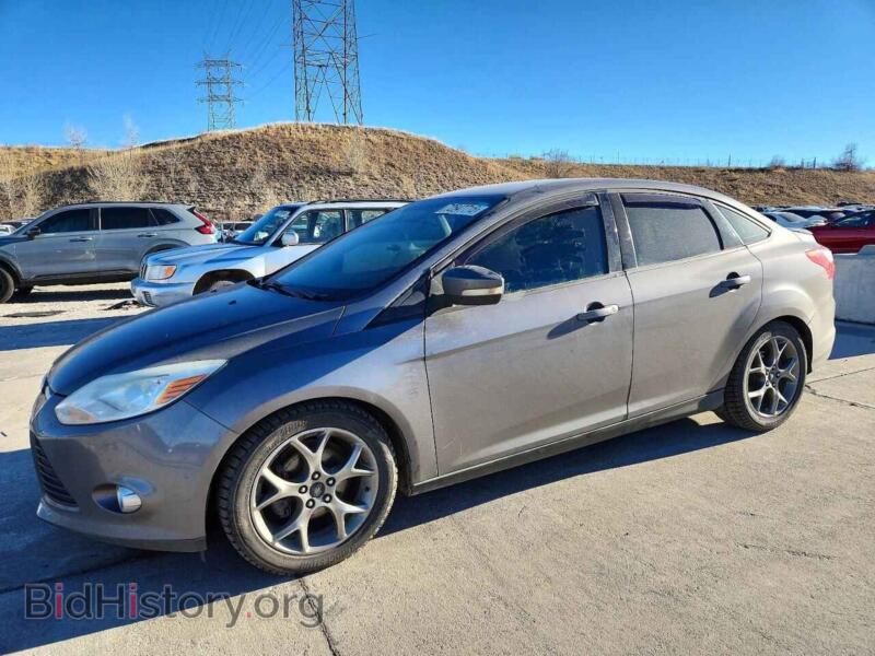 2014 Ford FOCUS (VIN 1FADP3F24EL175807) — фото 1 из 12, Copart, повреждение: днище