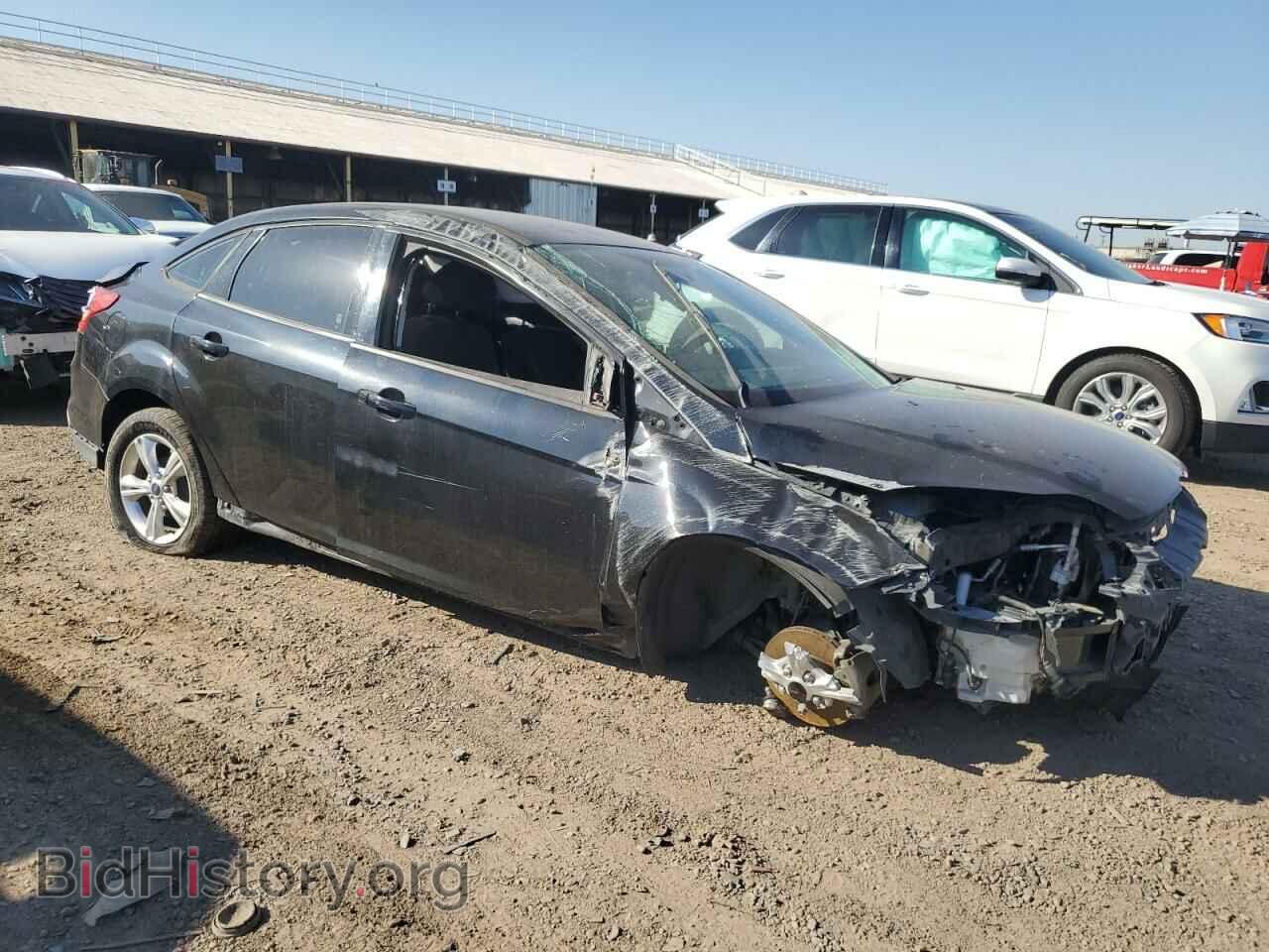 2014 FORD FOCUS - VIN: 1FADP3F2XEL111075 - Photo 4