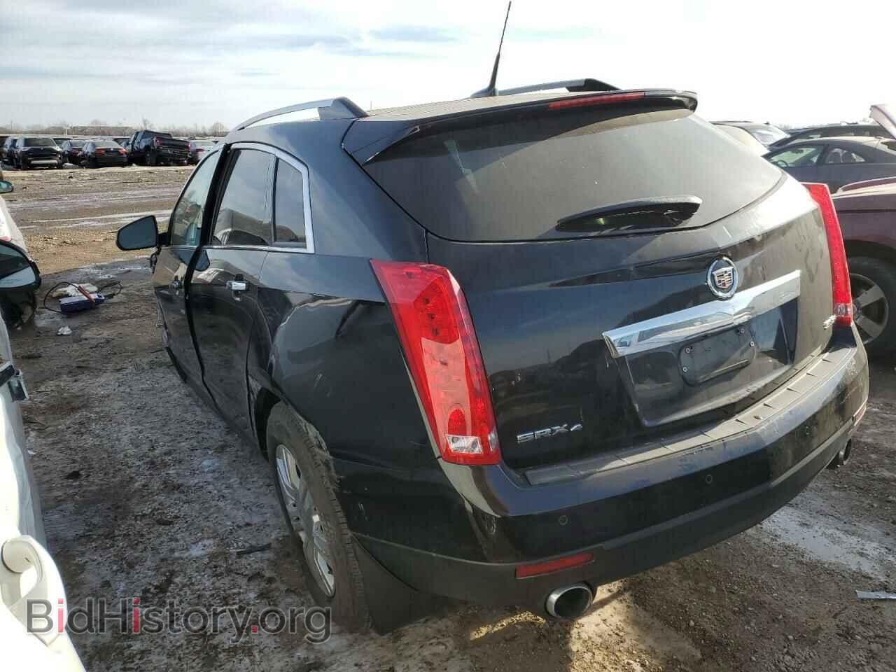 2014 CADILLAC SRX - VIN: 3GYFNEE30ES678429 - Фото 2