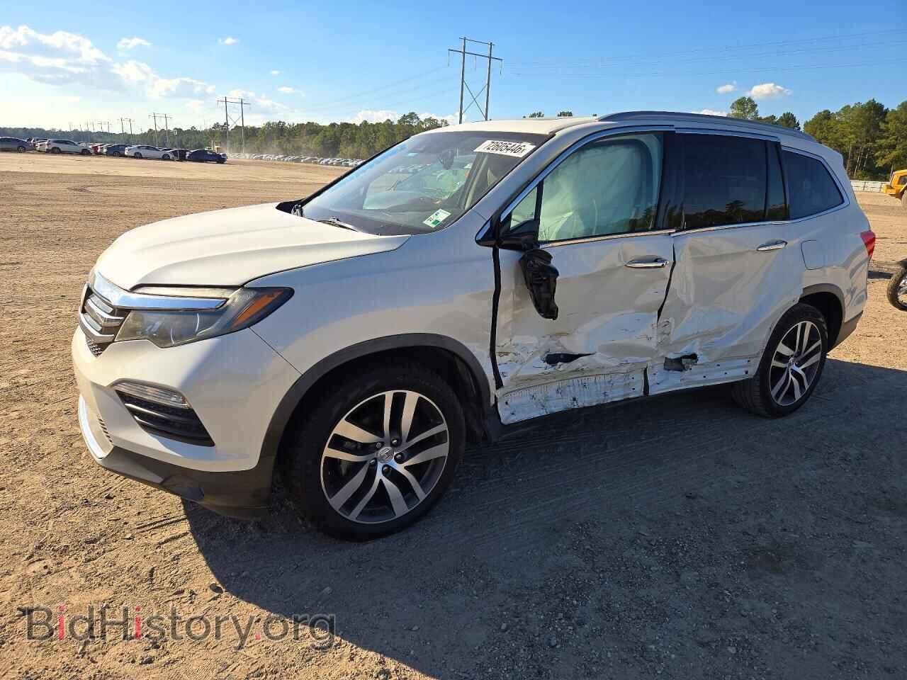 2016 Honda PILOT Touring (VIN 5FNYF5H9XGB042012) — фото 1 из 14, Copart, повреждение: бок