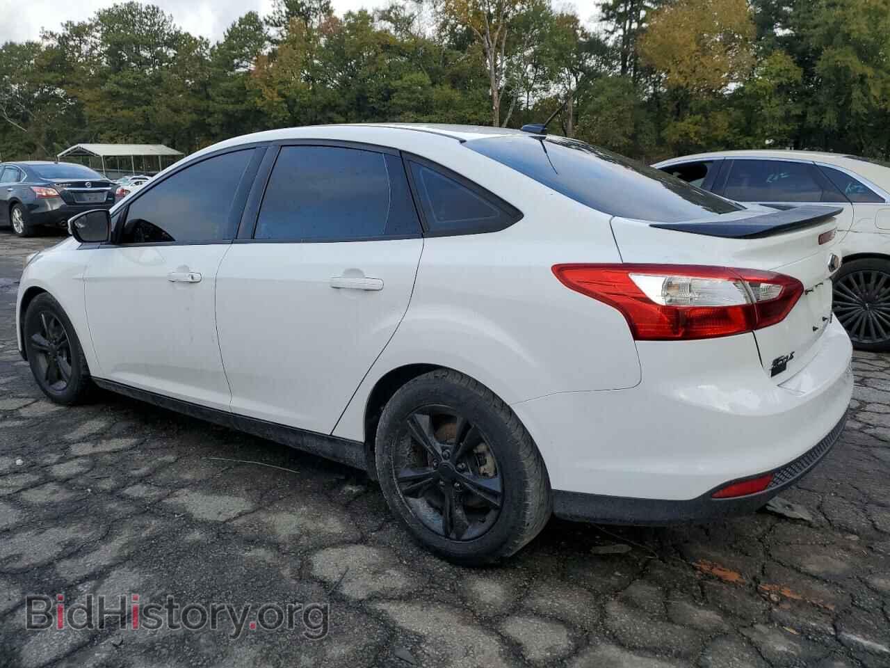 2014 FORD FOCUS - VIN: 1FADP3F21EL394000 - Photo 2
