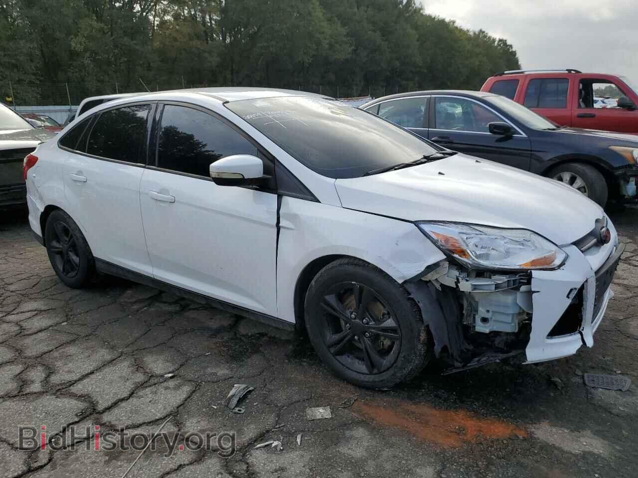 2014 FORD FOCUS - VIN: 1FADP3F21EL394000 - Photo 4