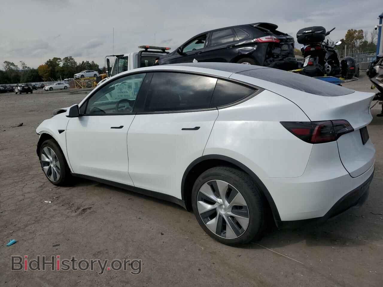 2023 TESLA MODEL Y - VIN: 7SAYGDEE4PF606989 - Photo 2