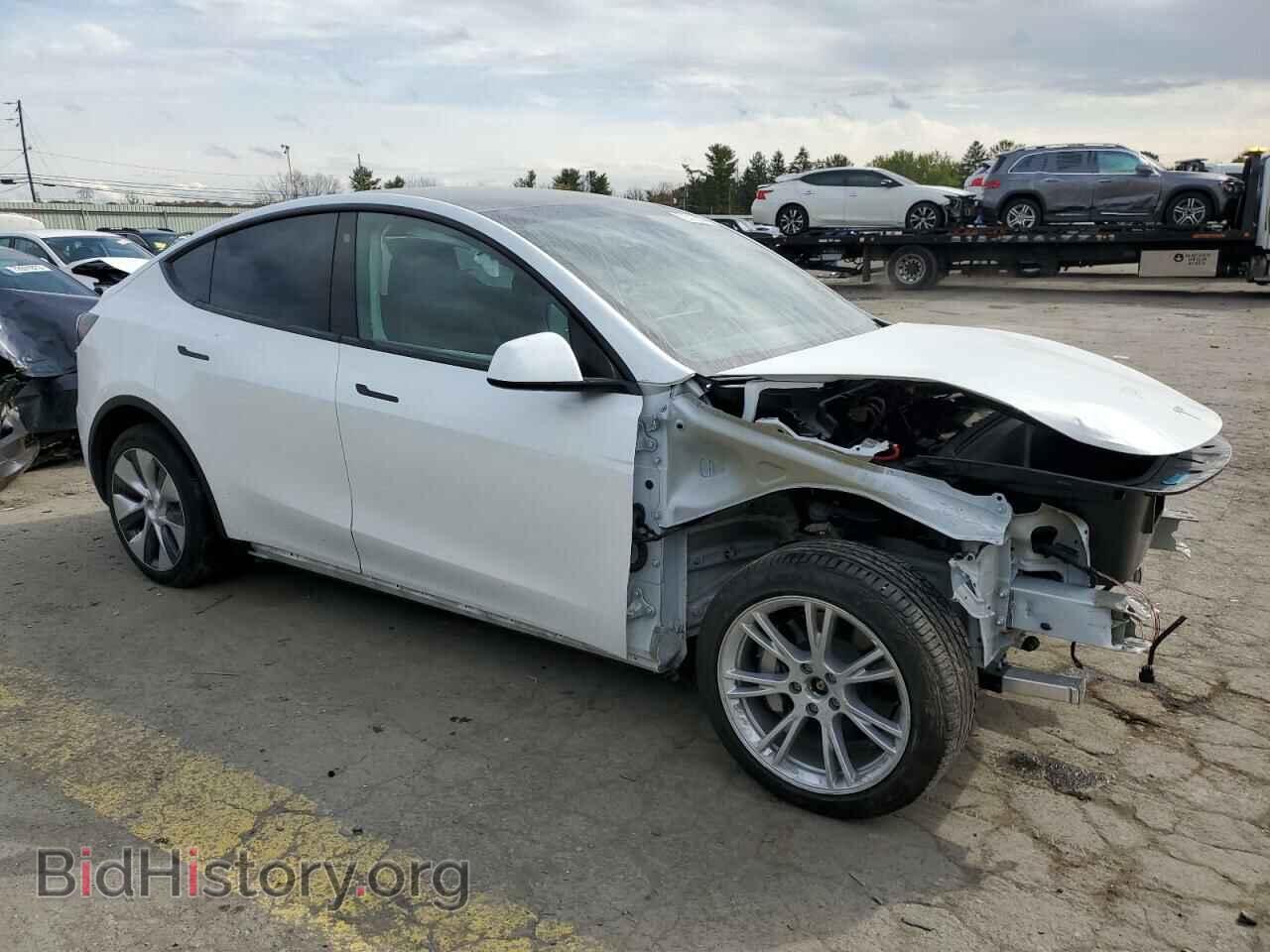 2023 TESLA MODEL Y - VIN: 7SAYGDEE4PF606989 - Photo 4