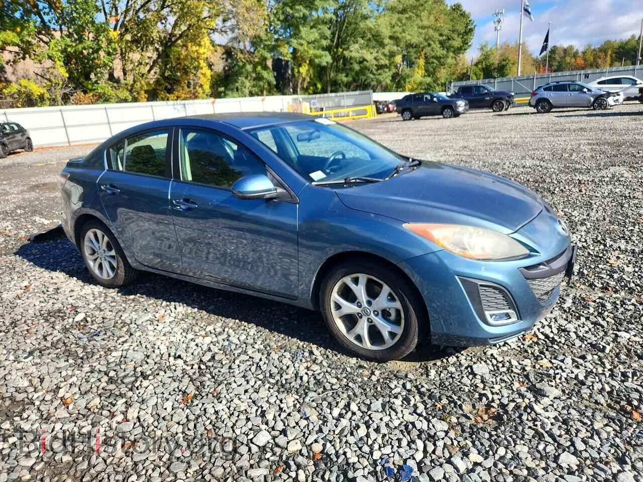 2011 Mazda MAZDA3 (VIN JM1BL1U60B1394259) — фото 4 из 13