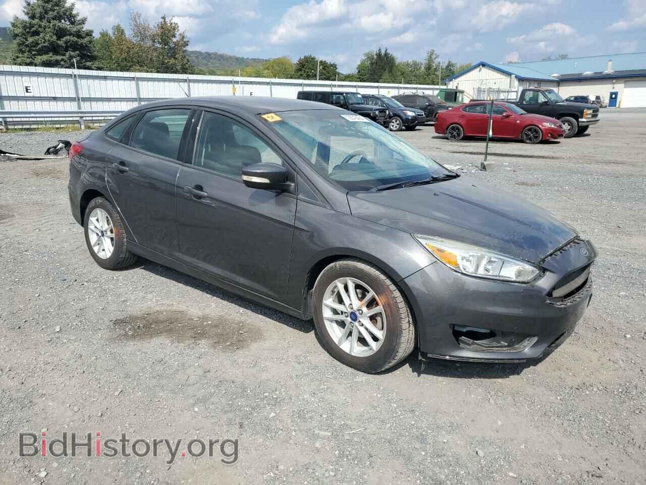 2015 FORD FOCUS - VIN: 1FADP3F23FL214033 - Photo 4