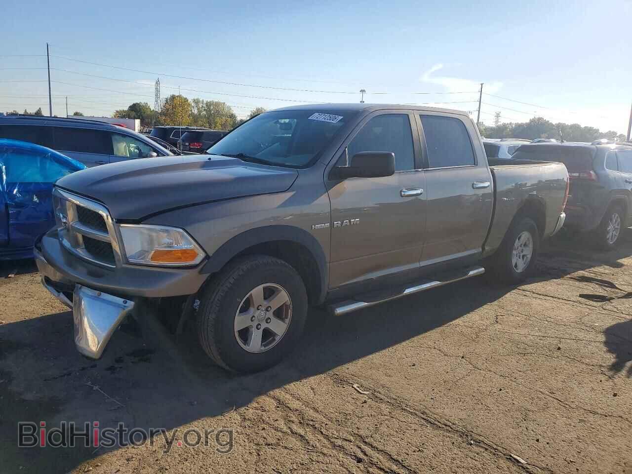 2009 Dodge RAM 1500 (VIN 1D3HV13T19S806681) — photo 1 of 14, Copart, damage: front end