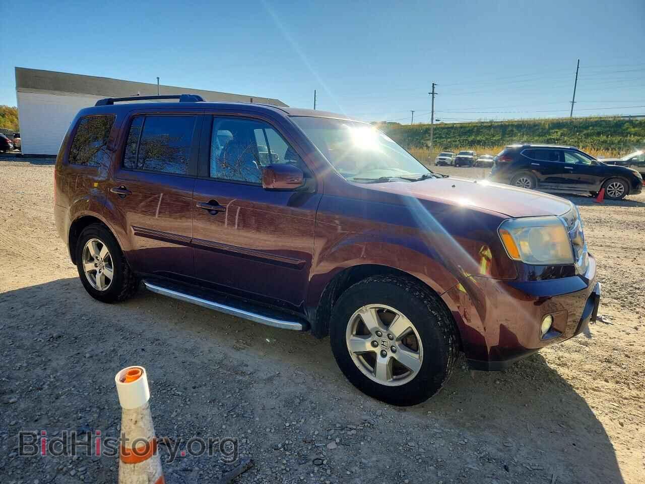2011 Honda PILOT (VIN 5FNYF4H59BB054393) — photo 4 of 13