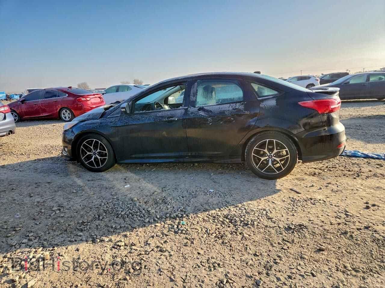2016 FORD FOCUS - VIN: 1FADP3F21GL328940 - Photo 2