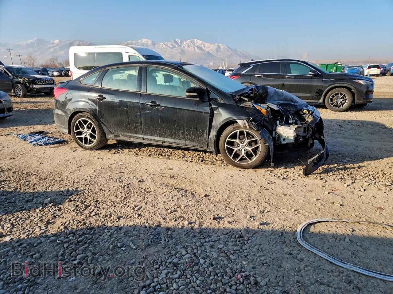 2016 FORD FOCUS - VIN: 1FADP3F21GL328940 - Photo 4