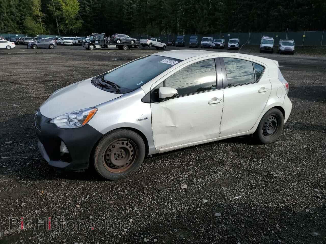 Фотография JTDKDTB36E1569281 - TOYOTA PRIUS 2014