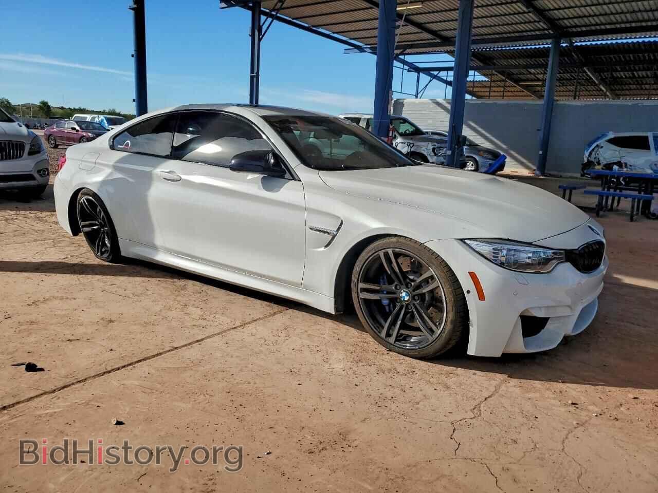 2015 BMW M4 - VIN: WBS3R9C51FK331593 - Фото 4