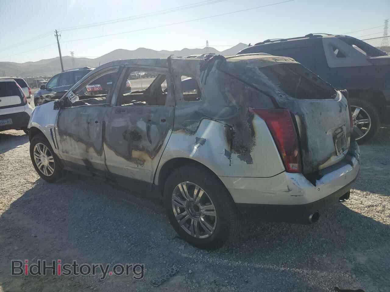 2013 CADILLAC SRX - VIN: 3GYFNCE35DS516864 - Фото 2