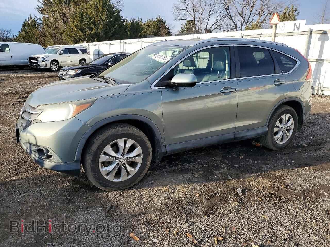 Фотография JHLRM4H75CC000750 - HONDA CRV 2012