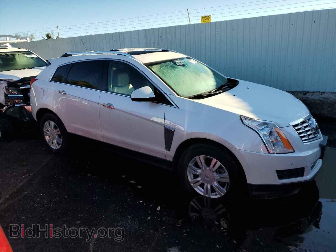 2016 CADILLAC SRX - VIN: 3GYFNEE39GS527155 - Фото 4