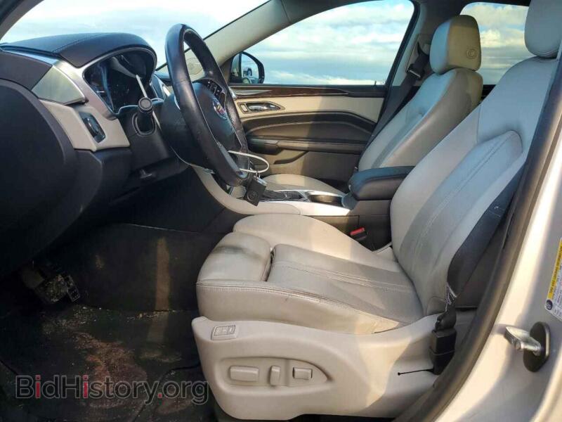 2013 Cadillac SRX (VIN 3GYFNCE34DS651320) — фото 7 из 12
