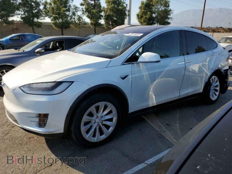 2020 Tesla MODEL X (VIN 5YJXCBE24LF304322) — photo 1 of 13, Copart, damage: side