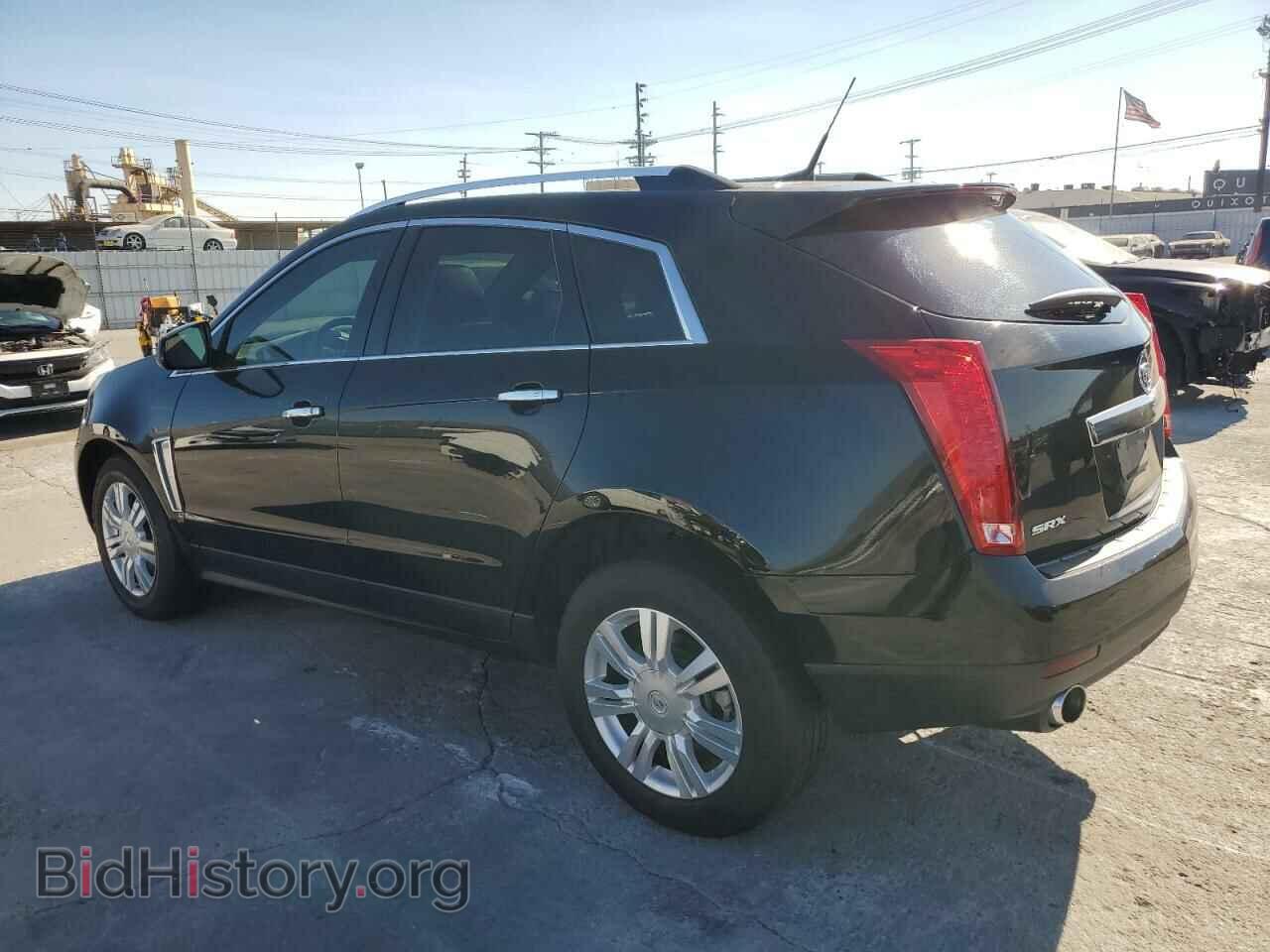 2014 CADILLAC SRX - VIN: 3GYFNDE32ES582859 - Photo 2