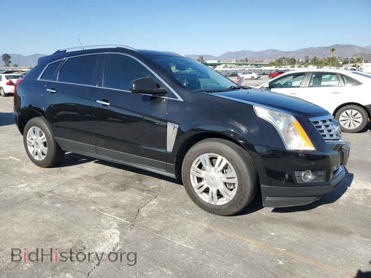 2014 CADILLAC SRX - VIN: 3GYFNDE32ES582859 - Photo 4