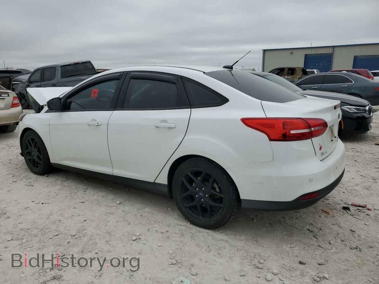 2016 FORD FOCUS - VIN: 1FADP3F20GL302099 - Фото 2