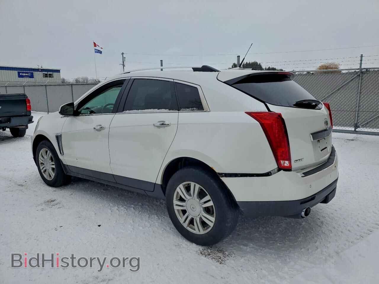2014 CADILLAC SRX - VIN: 3GYFNBE39ES687824 - Фото 2