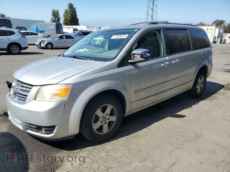 2010 Dodge CARAVAN SXT (VIN 2D4RN5D14AR203153) — photo 1 of 13, Copart, damage: front end