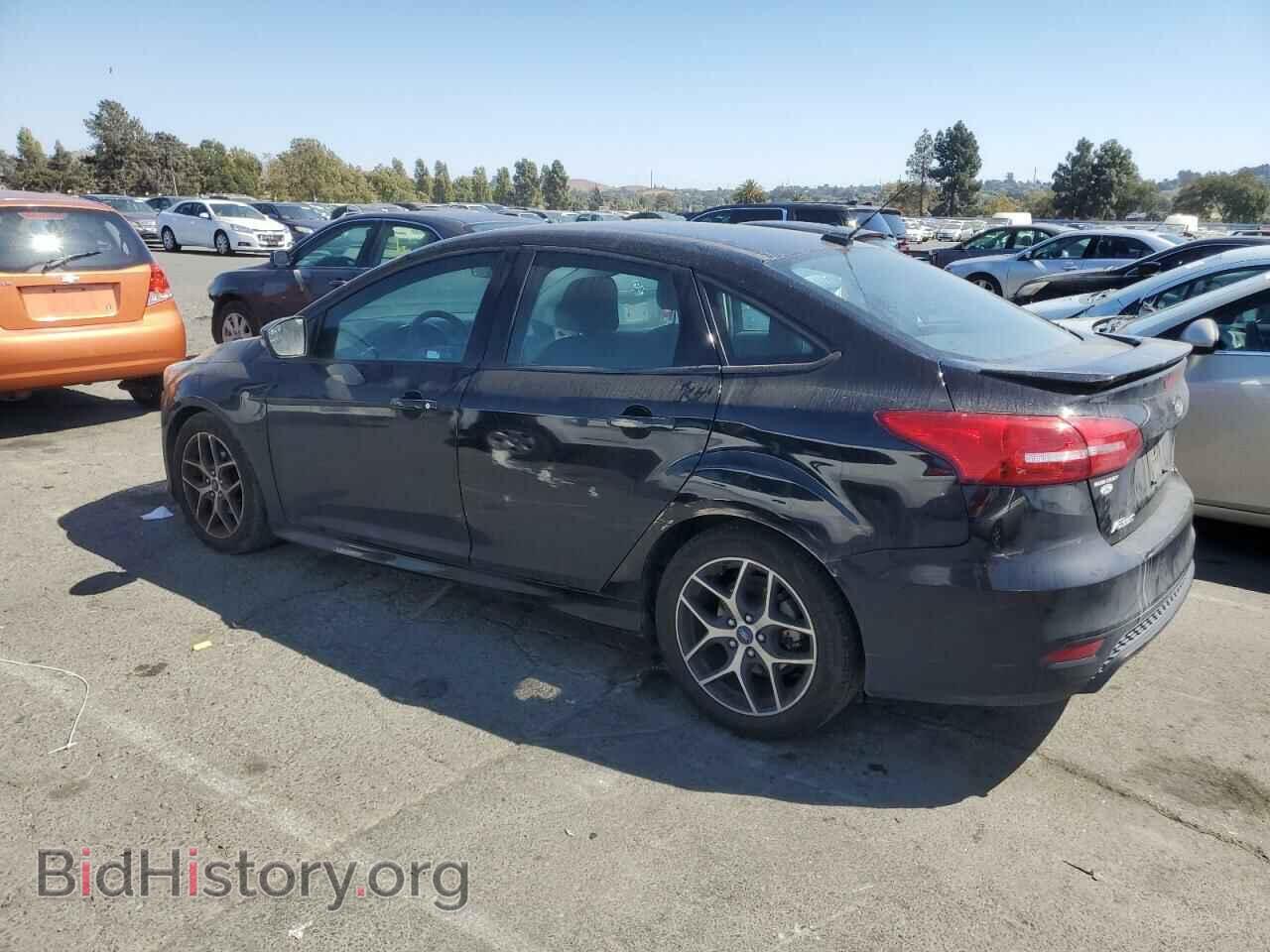 2016 FORD FOCUS - VIN: 1FADP3F23GL396074 - Фото 2