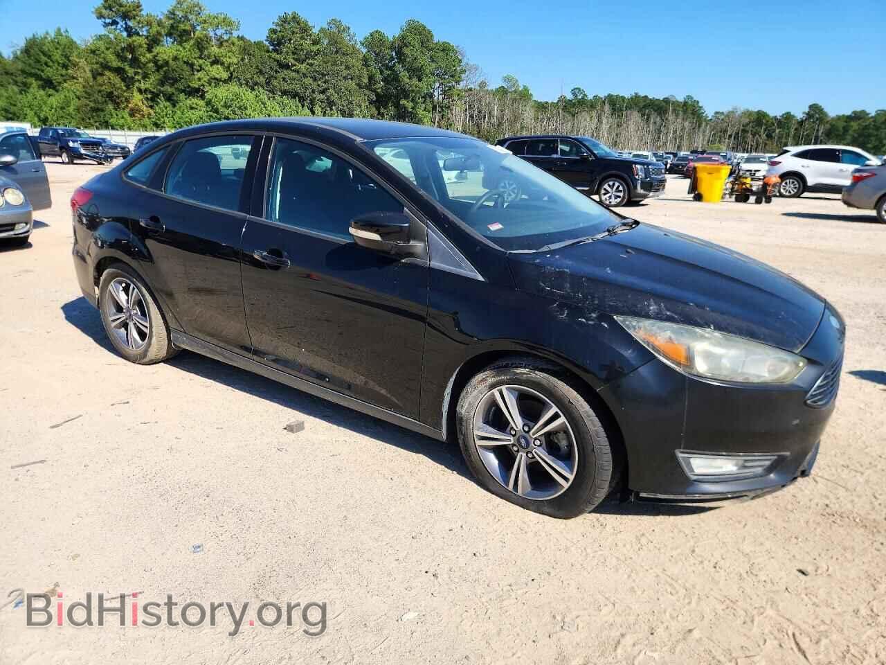 2017 FORD FOCUS - VIN: 1FADP3FEXHL256597 - Photo 4