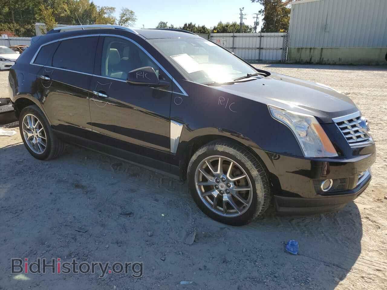 2014 CADILLAC SRX - VIN: 3GYFNCE37ES661616 - Фото 4