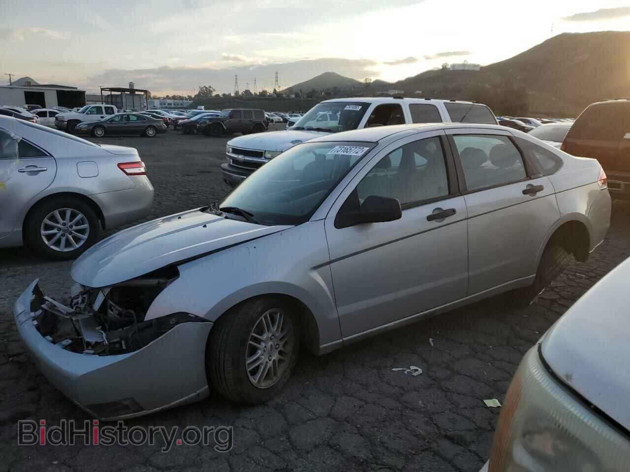 Фотография 1FAHP35N49W153596 - FORD FOCUS 2009