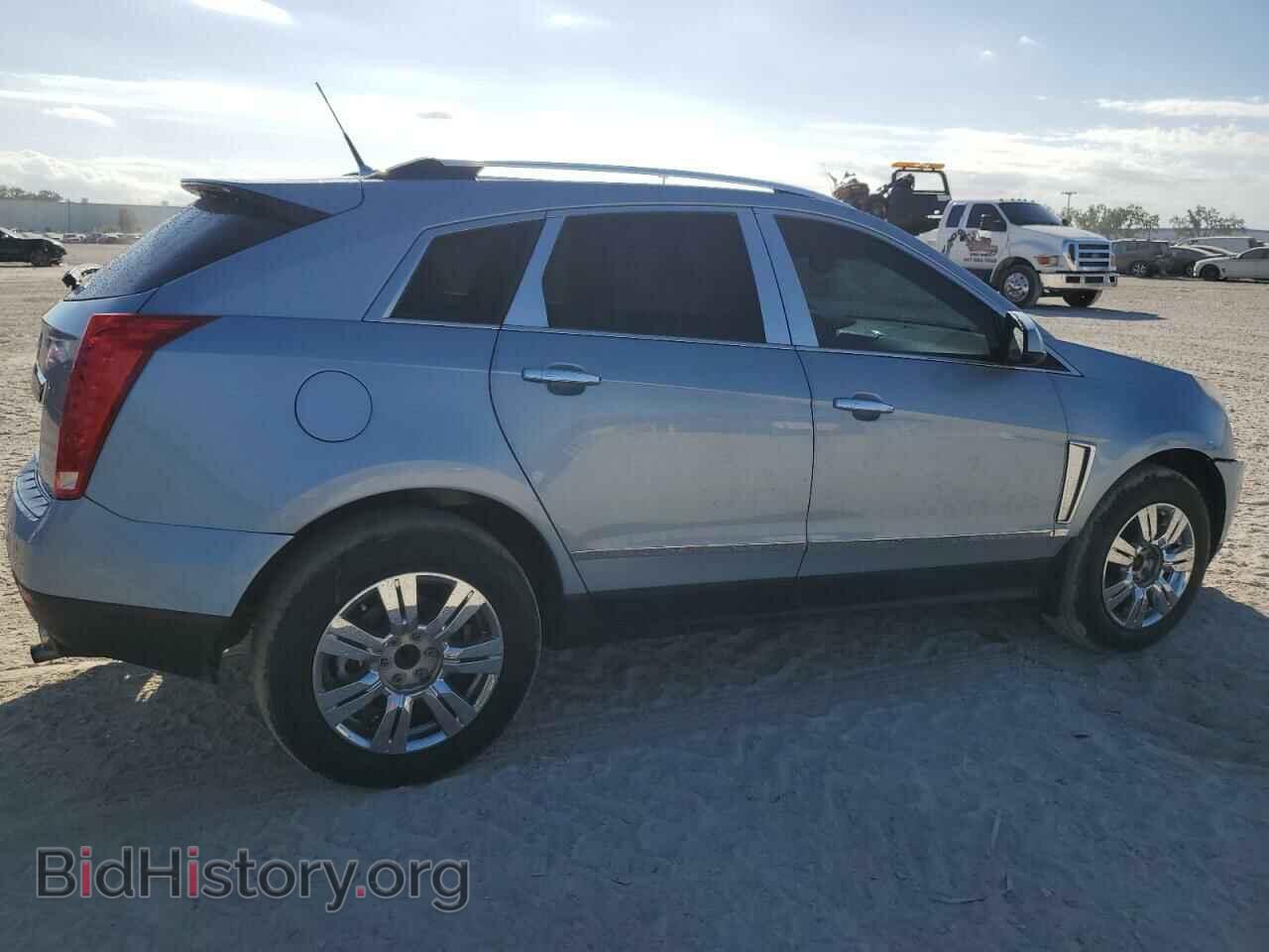 2014 CADILLAC SRX - VIN: 3GYFNBE32ES582879 - Фото 3