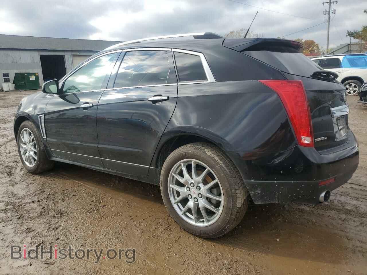 2014 CADILLAC SRX - VIN: 3GYFNEE35ES565849 - Фото 2