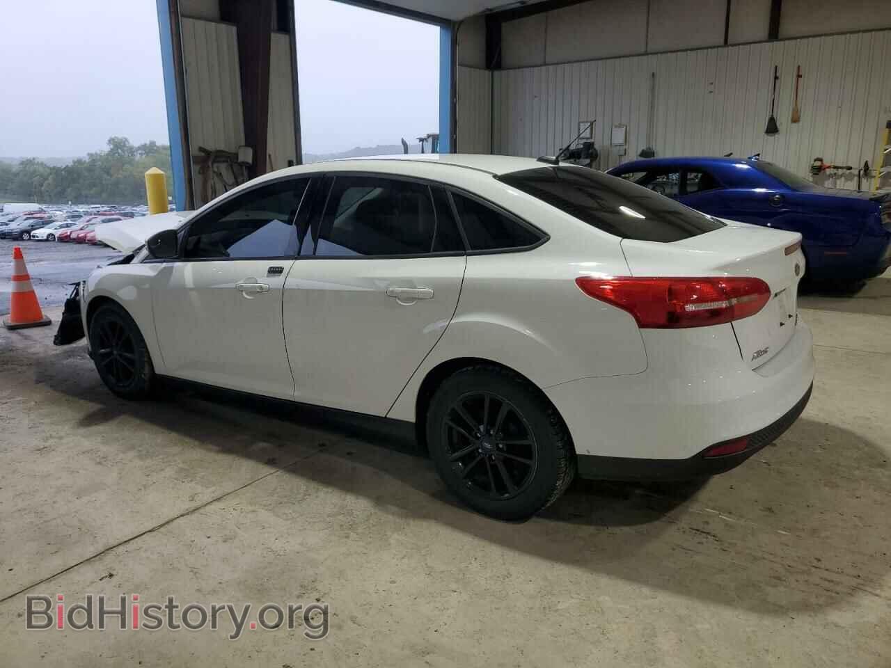 2016 FORD FOCUS - VIN: 1FADP3F21GL372226 - Фото 2