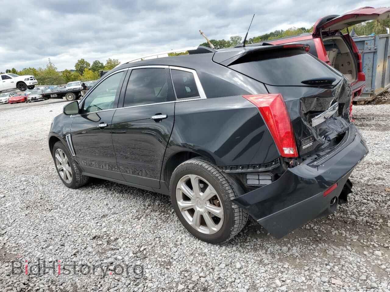 2014 CADILLAC SRX - VIN: 3GYFNDE31ES518781 - Фото 2