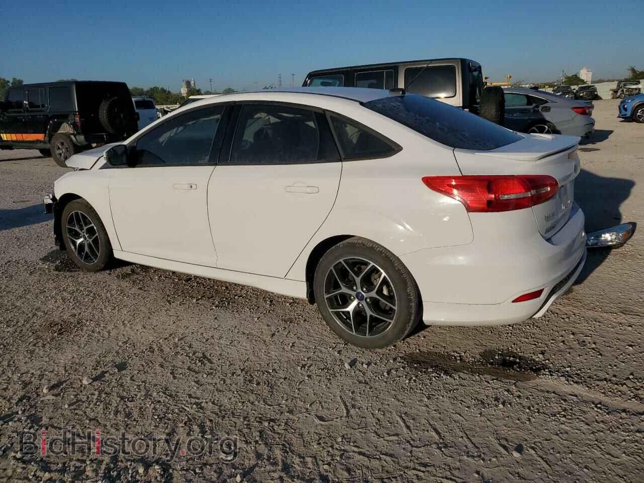 2016 FORD FOCUS - VIN: 1FADP3F21GL310194 - Фото 2
