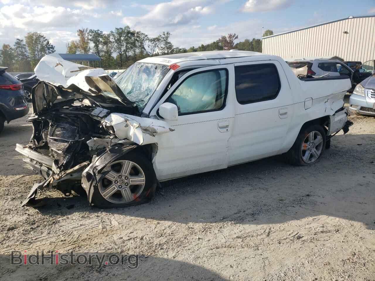 Photo 5FPYK1F57BB010509 - HONDA RIDGELINE 2011