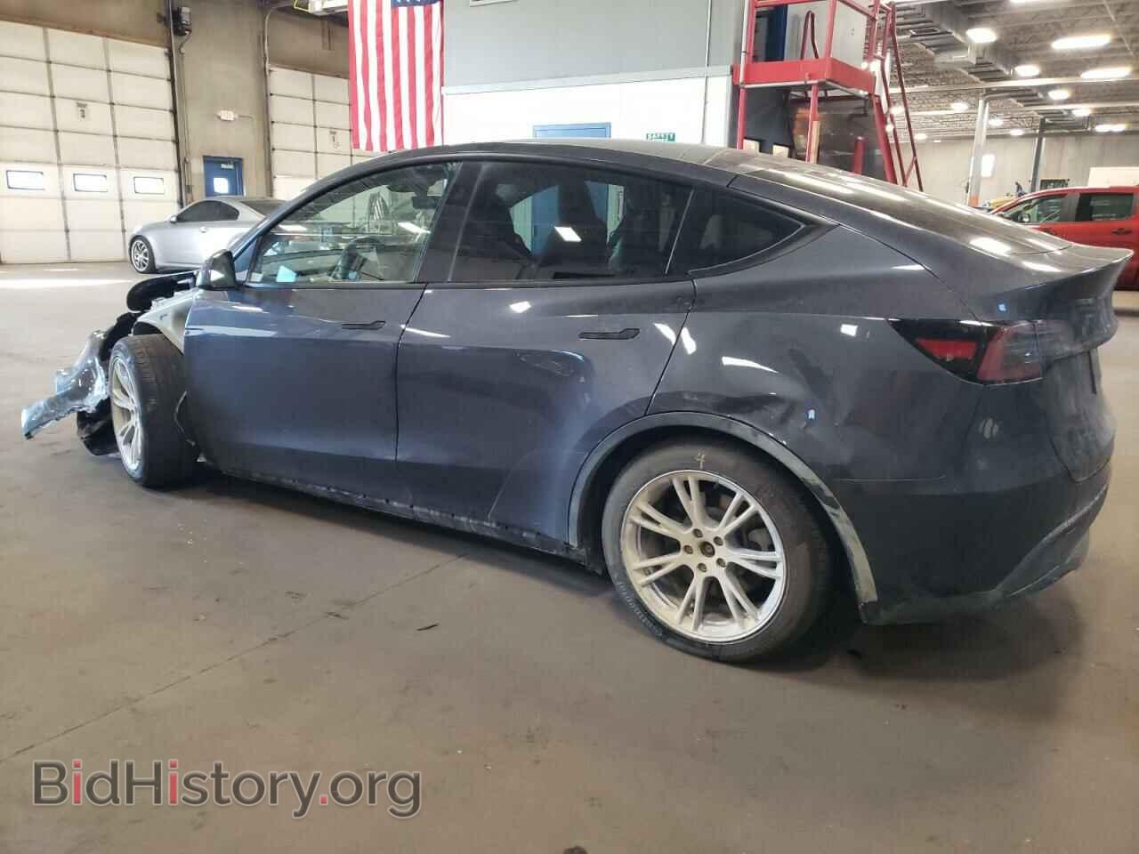 2023 TESLA MODEL Y - VIN: 7SAYGAEE6PF950113 - Photo 2