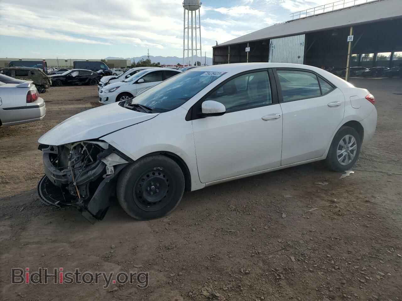 Фотография 5YFBURHEXEP173877 - TOYOTA COROLLA 2014
