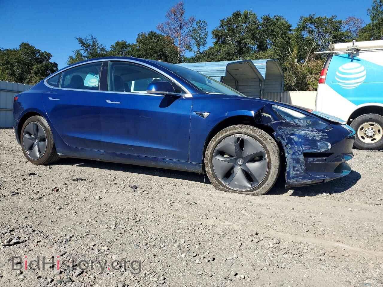 2018 Tesla MODEL 3 (VIN 5YJ3E1EA4JF041143) — photo 4 of 12
