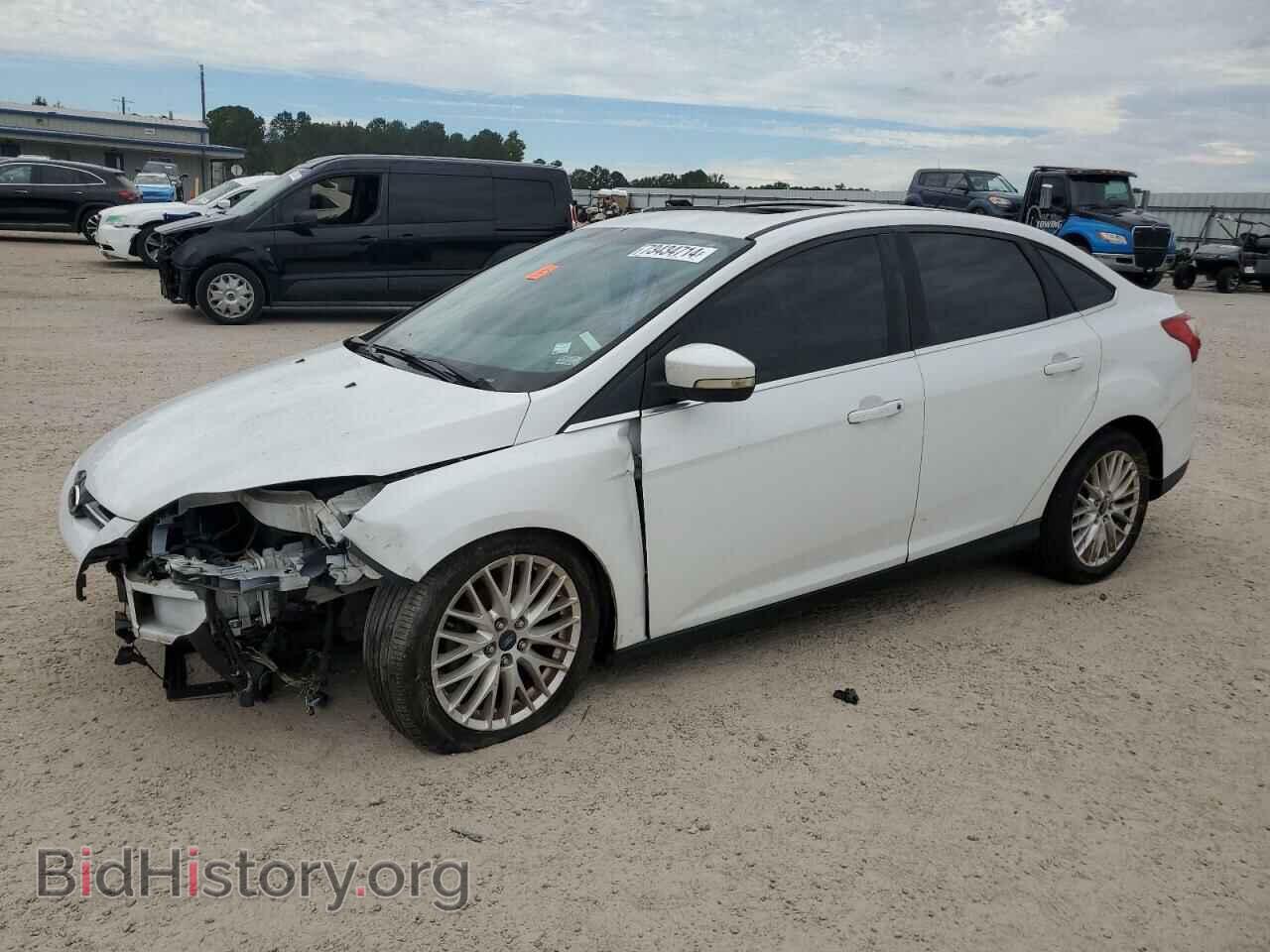 Фотография 1FAHP3H20CL424597 - FORD FOCUS 2012