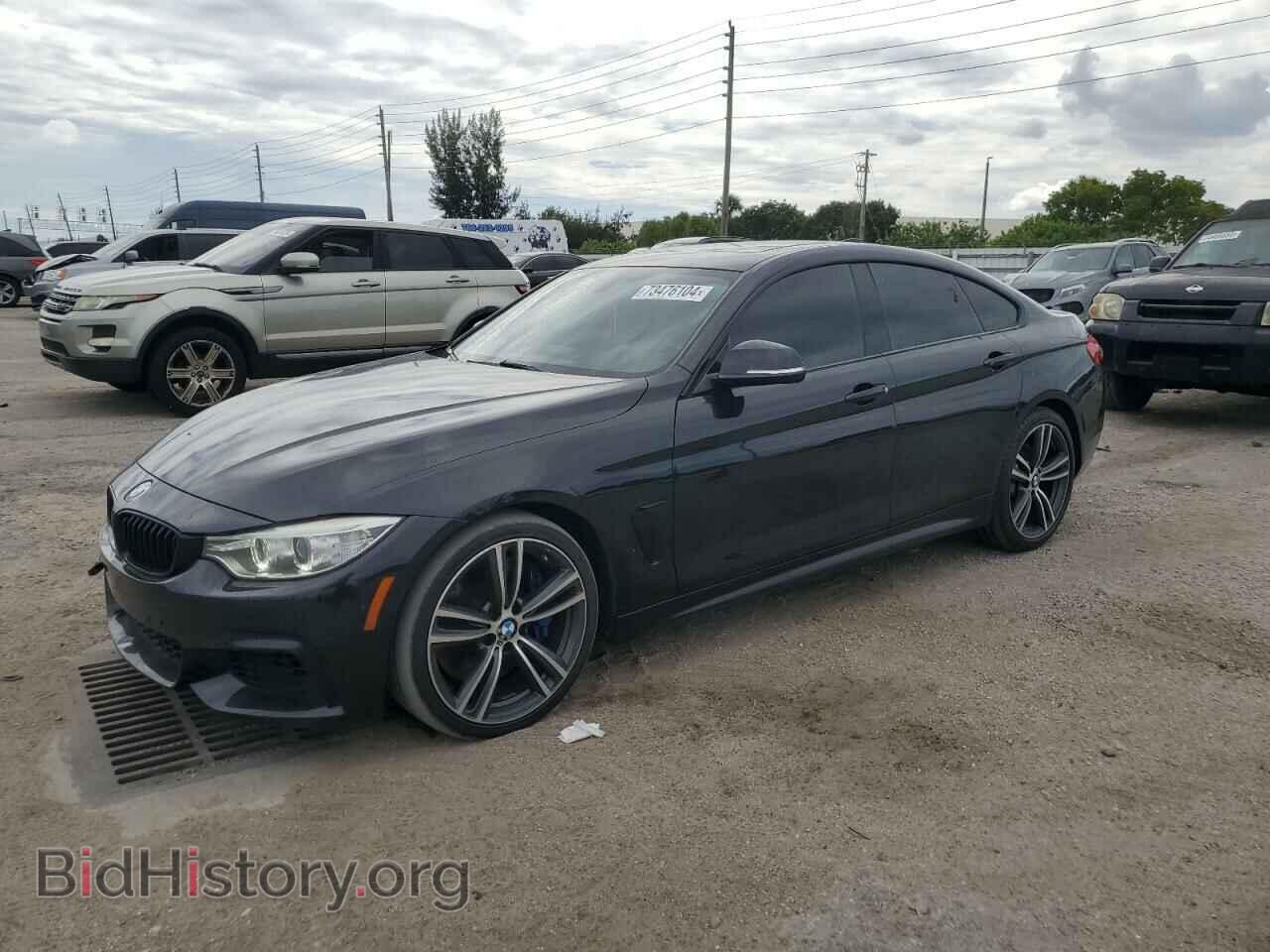 Фотография WBA4B1C53FD955219 - BMW 4 SERIES 2015