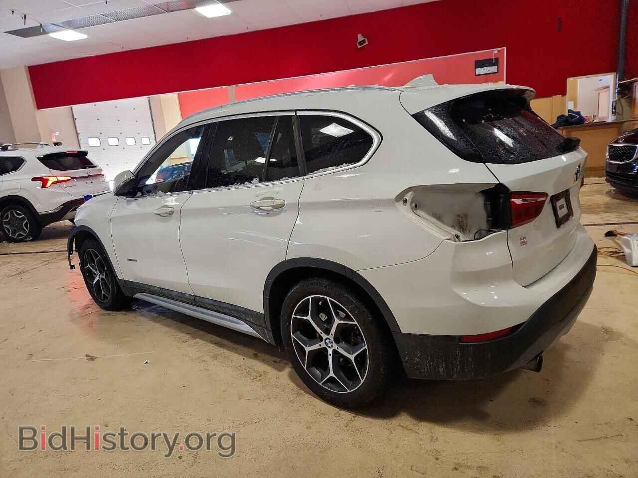 2017 BMW X1 - VIN: WBXHT3Z31H4A57732 - Фото 2