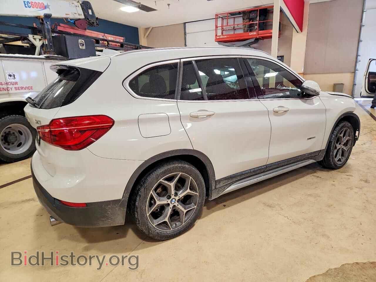2017 BMW X1 - VIN: WBXHT3Z31H4A57732 - Фото 3