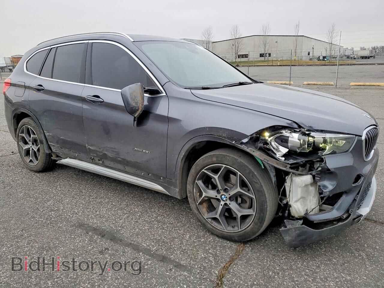 2017 BMW X1 - VIN: WBXHT3Z30H4A55292 - Фото 4