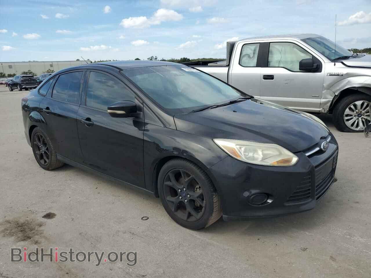 2014 FORD FOCUS - VIN: 1FADP3F23EL104209 - Photo 4
