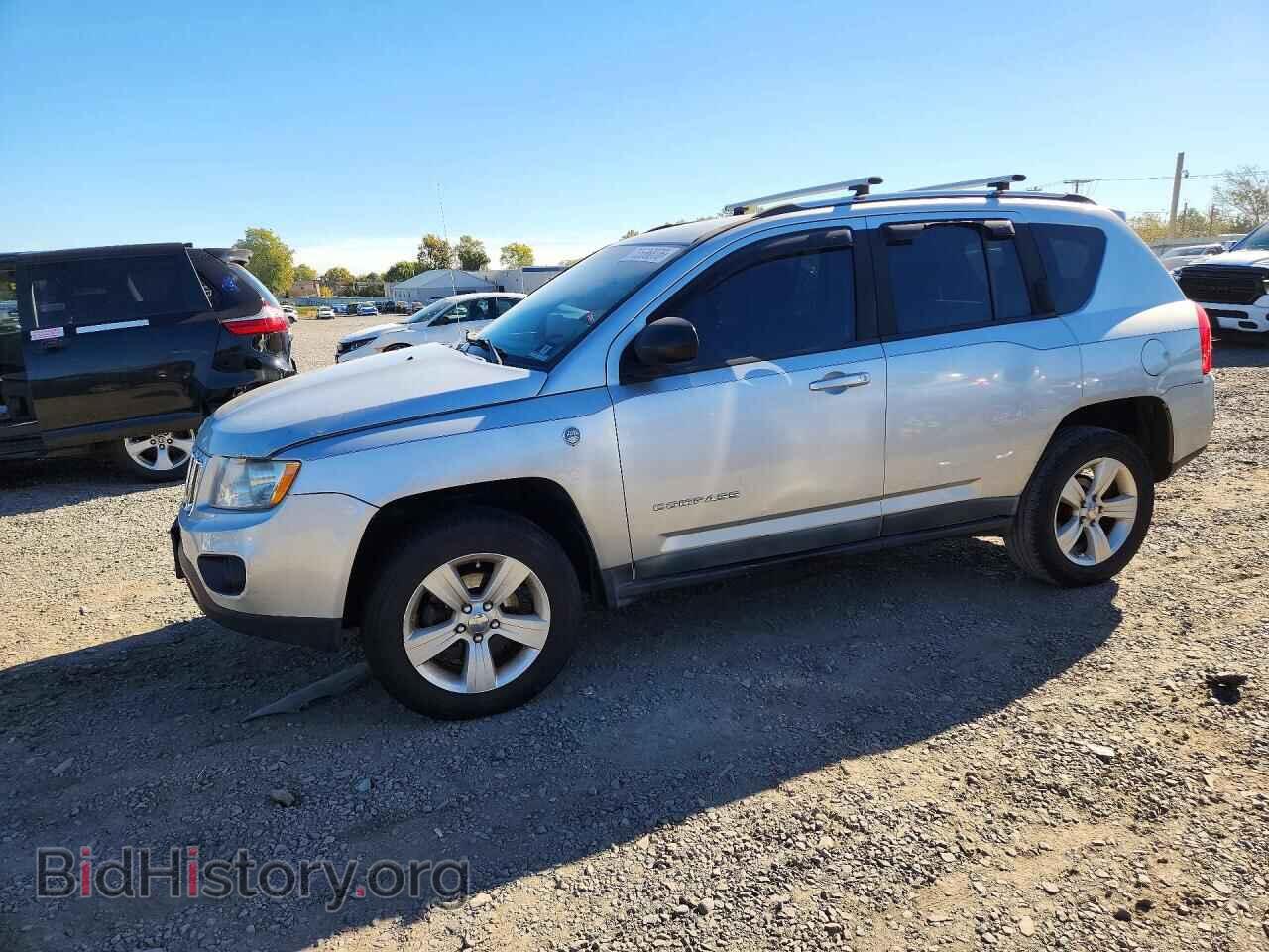 2011 Jeep COMPASS Sport (VIN 1J4NF1FBXBD240603) — photo 1 of 13, Copart, damage: front end