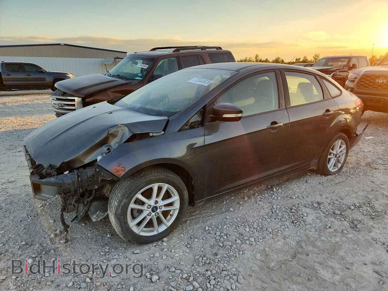 2015 Ford FOCUS SE (VIN 1FADP3F21FL349737) — photo 1 of 12, Copart, damage: front end