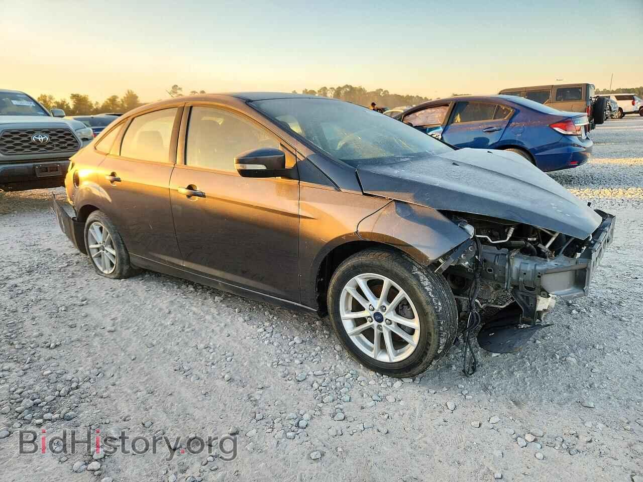 2015 Ford FOCUS (VIN 1FADP3F21FL349737) — photo 4 of 12