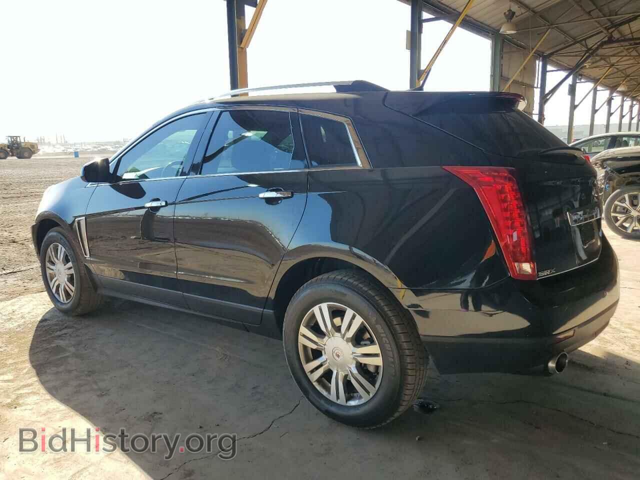2013 CADILLAC SRX - VIN: 3GYFNCE38DS615338 - Фото 2