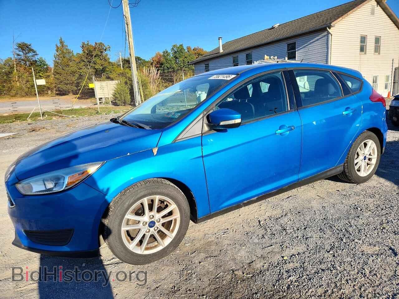 2015 Ford FOCUS SE (VIN 1FADP3K29FL315549) — фото 1 из 12, Copart, повреждение: бок
